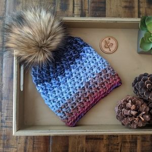 Women's multicolor hat with luxury faux fur pompom